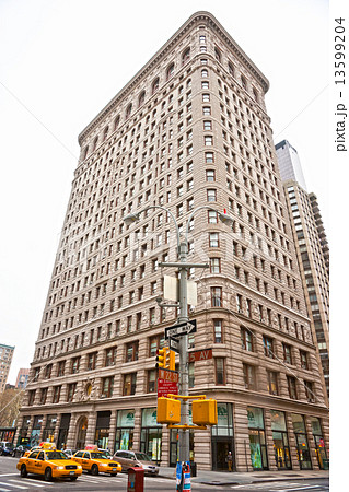 NEW YORK -MARCH 29: Flat Iron building facade on March 29, 2011. NEW YORK -MARCH 29: Flat Iron building facade on March 29, 2011. 13599204