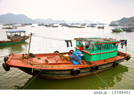 Boat in Cat ba Island, Halong Bay, Vietnam. Unesco World Heritag Boat in Cat ba Island, Halong Bay, Vietnam. Unesco World Heritag 13599401