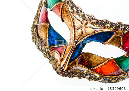 Close-up of colored venetian mask. Isolated on white. Close-up of colored venetian mask. Isolated on white. 13599608