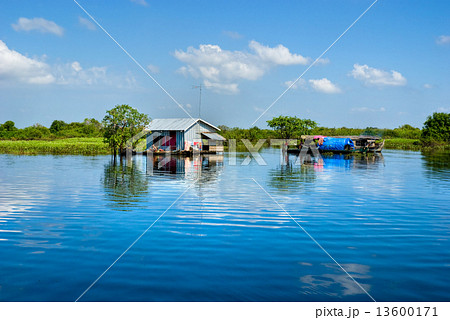 Floating House and Houseboat on the Tonle Sap lake, Cambodia. Floating House and Houseboat on the Tonle Sap lake, Cambodia. 13600171