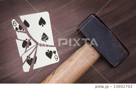 Hammer with a broken card, six of spades Hammer with a broken card, six of spades 13602702