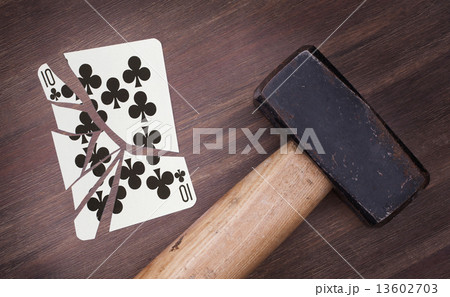Hammer with a broken card, ten of clubs 13602703