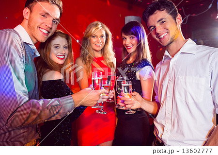 Happy friends on a night out together 13602777