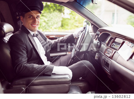 Limousine driver smiling at camera 13602812