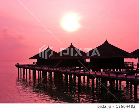 Water bungalows and sunset Water bungalows and sunset 13604482
