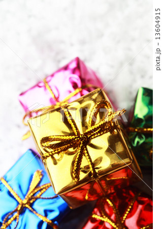 The small gift box group on snow for decoration christmas The small gift box group on snow for decoration christmas 13604915