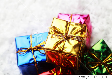 The small gift box group on snow for decoration christmas 13604916