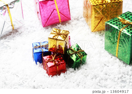 The small gift box group on snow for decoration christmas 13604917
