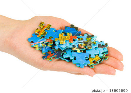 Hand and puzzle Hand and puzzle 13605699