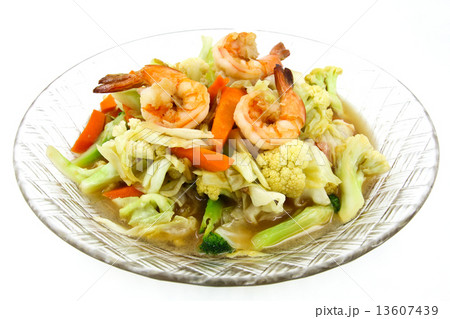 Stir-fried vegetables with shrimp on a plate. 13607439