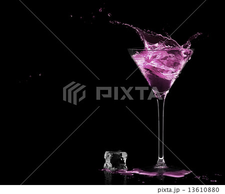 Cocktail Glass with Strawberry Spirit Drink Splashing. 13610880