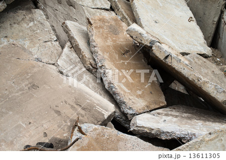 Heap of the damaged concrete blocks 13611305