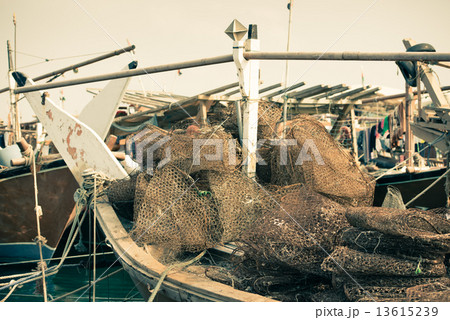 Old fishing boats with rusty nets 13615239