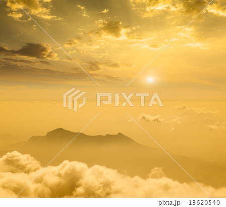 Mountains in cloud on sunset 13620540