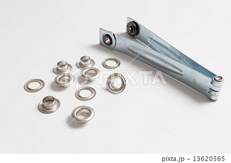 Rivets on a light background. 13620565