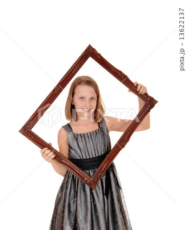 Pretty girl holding picture frame. Pretty girl holding picture frame. 13622137