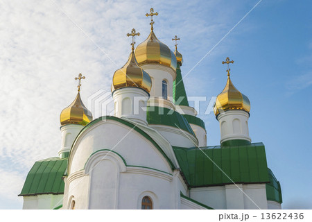 Domes of orthodox temple against the sky. 13622436