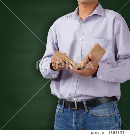 Teacher in classroom 13633534