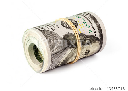 Roll of  hundred dollar bills isolated 13633718