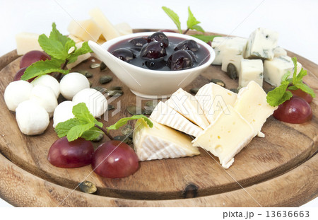 cheese plate with several varieties of cheese in the restaurant 13636663
