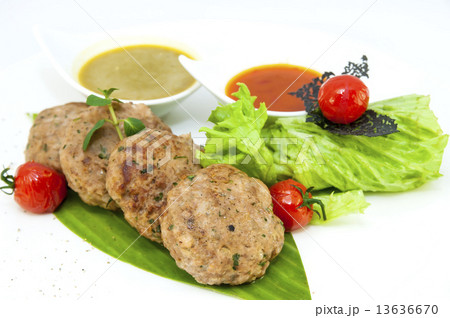 vegetarian meatballs with salad on a white background in restaurant 13636670