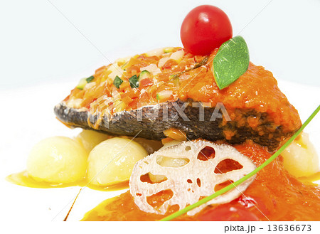 baked fish with potatoes in tomato sauce 13636673