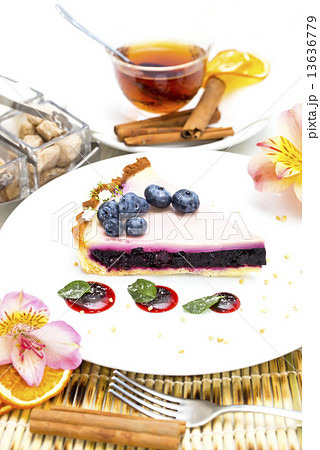 piece of blueberry pie on a table in a restaurant 13636779