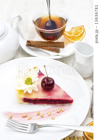 piece of cherry pie on a table in a restaurant piece of cherry pie on a table in a restaurant 13636781