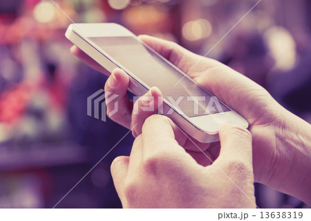 Woman Using a Smart Phone 13638319