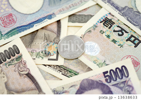 Japanese money 100 Yen coin on banknotes. Background business concept for marketing promotion price. 13638633