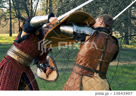 Two knights fighting in the fores 13643907