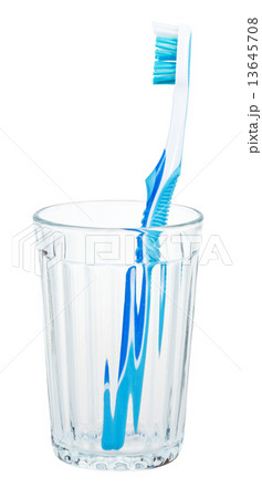blue toothbrush in glass isolated on white 13645708