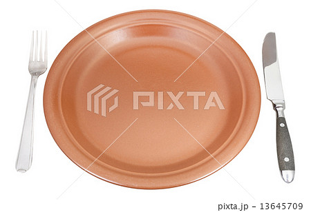 brown plate with fork and knife set isolated brown plate with fork and knife set isolated 13645709