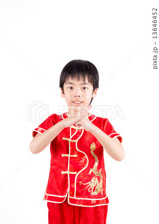 Cute Asian Boy In Tradition Chinese Cheongsam Isolated On White Cute Asian Boy In Tradition Chinese Cheongsam Isolated On White 13646452