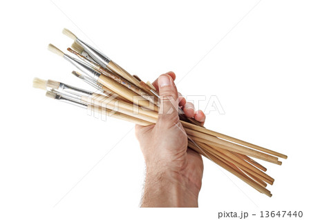 Brushes in hand of the artist Brushes in hand of the artist 13647440