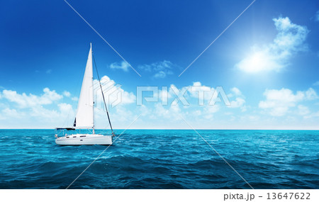 Yacht Sailing on water of ocean Yacht Sailing on water of ocean 13647622
