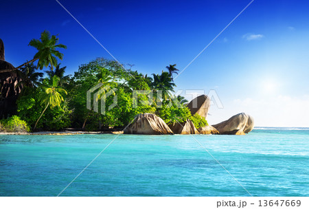 sunset on the beach, Anse Source d'Argent, La Digue island, Seyc 13647669