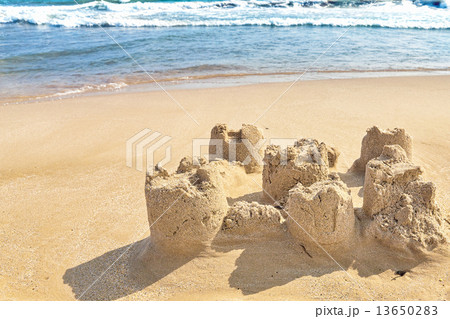 Destroyed sand castle on a beach. Spain Destroyed sand castle on a beach. Spain 13650283