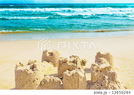 Destroyed sand castle on a beach. Spain 13650284