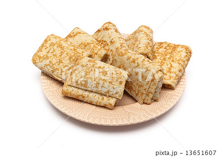 Russian pancakes with meat on a plate isolated on white backgrou 13651607