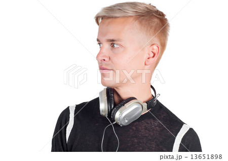 Young handsome male with earphones Young handsome male with earphones 13651898
