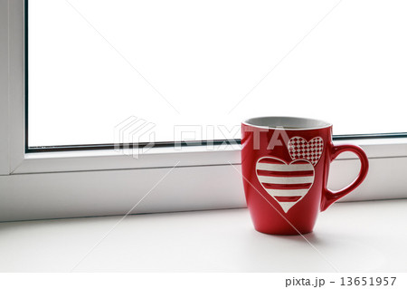 cup with hearts on the background isolated 13651957