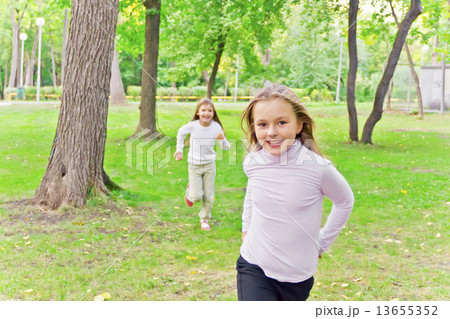 Cute two running girls Cute two running girls 13655352