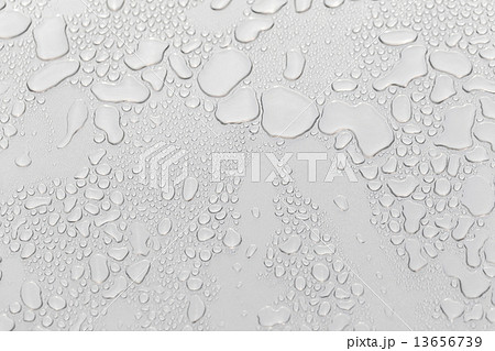 Metal surface covered in water drops. Metal surface covered in water drops. 13656739