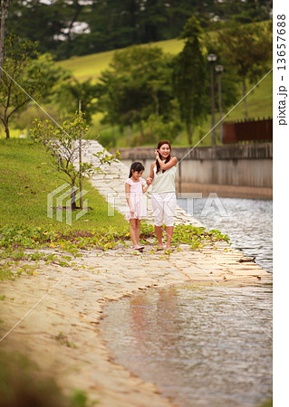 Family, Three, happy, pretty, handsome, kid, embrace, park, couple, outdoor activity, picnic, enjoys 13657688