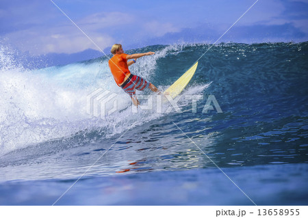 Surfer on Amazing Blue Wave Surfer on Amazing Blue Wave 13658955