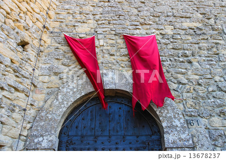 Red flags over the gates fortresses in San Marino. The Republic Red flags over the gates fortresses in San Marino. The Republic 13678237