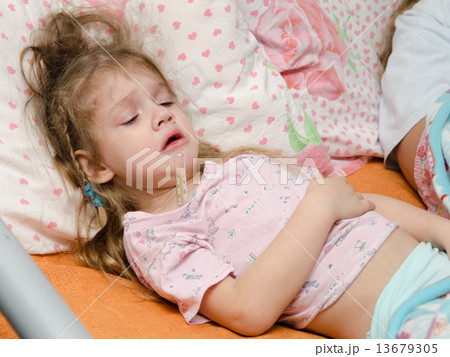 Diseased three year old girl suffering from high temperature Diseased three year old girl suffering from high temperature 13679305