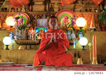 A monk praying 13679683