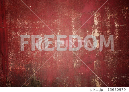 Freedom message written on cracked concrete Freedom message written on cracked concrete 13680979